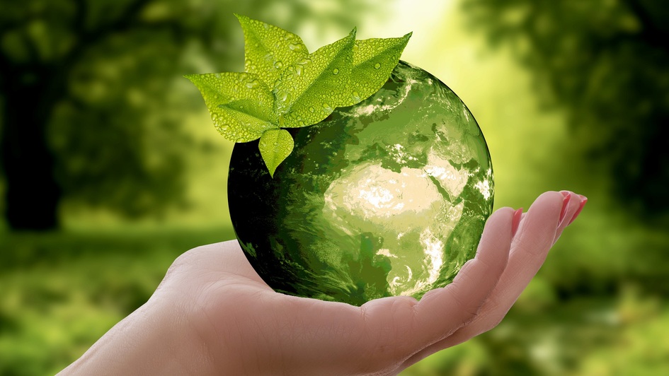 Weltkugel in einer Hand