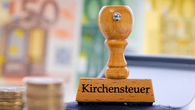 Stempel mit der Aufschrift Kirchensteuer