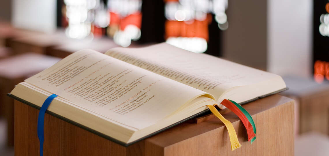 Open bible on altar.